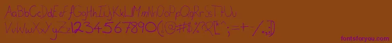 CalisInPuppetland Font – Purple Fonts on Brown Background