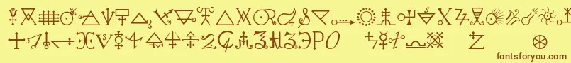 Alchemya-Schriftart – Braune Schriften auf gelbem Hintergrund