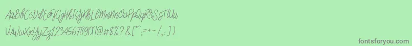fuente SlainteScriptDemo – Fuentes Grises Sobre Fondo Verde