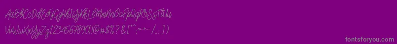 SlainteScriptDemo-fontti – harmaat kirjasimet violetilla taustalla