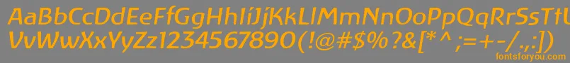 Czcionka LinotypeAtlantisItalic – pomarańczowe czcionki na szarym tle