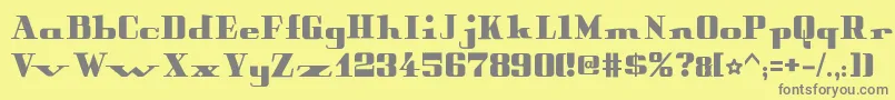 PeterObscureBold-fontti – harmaat kirjasimet keltaisella taustalla