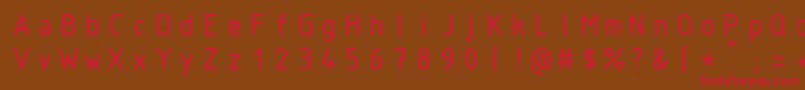 フォントIsocteur – 赤い文字が茶色の背景にあります。