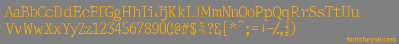 フォントThirdcopyssk – オレンジの文字は灰色の背景にあります。