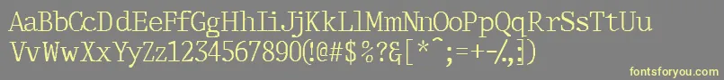 フォントThirdcopyssk – 黄色のフォント、灰色の背景