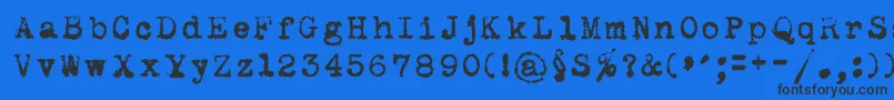 Maszyna ffy-fontti – mustat fontit sinisellä taustalla