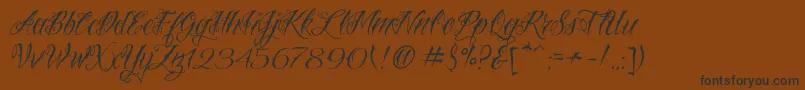 fuente VtcNuetattooscript – Fuentes Negras Sobre Fondo Marrón