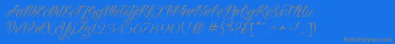 VtcNuetattooscript-Schriftart – Graue Schriften auf blauem Hintergrund