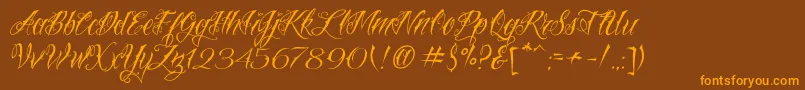 VtcNuetattooscript-Schriftart – Orangefarbene Schriften auf braunem Hintergrund