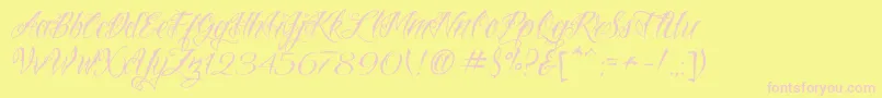 VtcNuetattooscript-Schriftart – Rosa Schriften auf gelbem Hintergrund