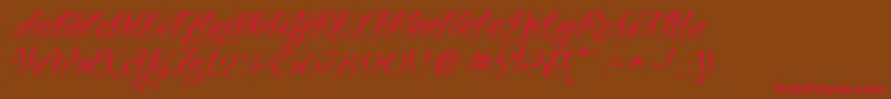 VtcNuetattooscript-Schriftart – Rote Schriften auf braunem Hintergrund