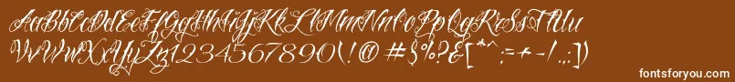 Fonte VtcNuetattooscript – fontes brancas em um fundo marrom