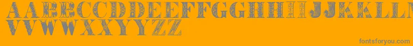 Westbalaio-Schriftart – Graue Schriften auf orangefarbenem Hintergrund