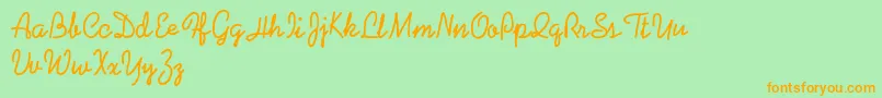 Coalpenpersonaluse Font – Orange Fonts on Green Background
