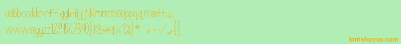 MtfCutiePatootie-Schriftart – Orangefarbene Schriften auf grünem Hintergrund