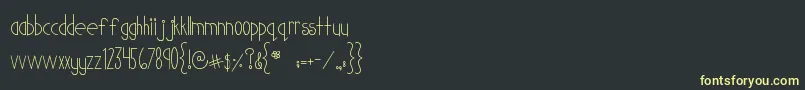 フォントMtfCutiePatootie – 黒い背景に黄色の文字