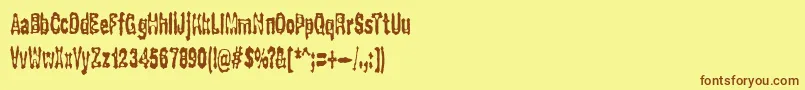 フォントGasping – 茶色の文字が黄色の背景にあります。