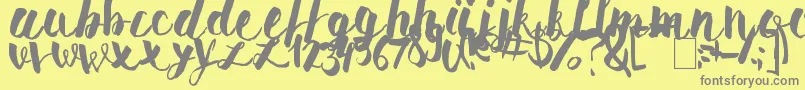 PomahType Font – Gray Fonts on Yellow Background