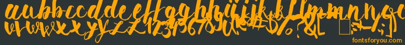 PomahType Font – Orange Fonts on Black Background