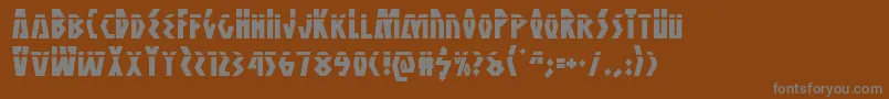 フォントAntikytheralaser – 茶色の背景に灰色の文字