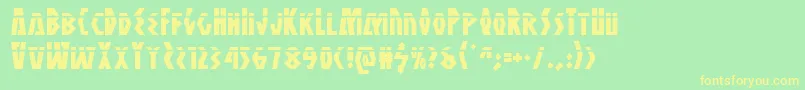 フォントAntikytheralaser – 黄色の文字が緑の背景にあります