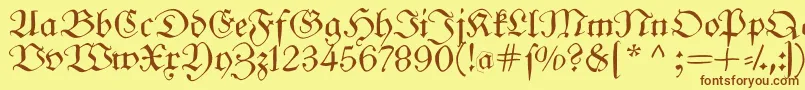 フォントFrungturafs – 茶色の文字が黄色の背景にあります。