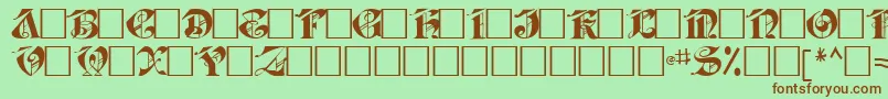 Jabacaps105Regular-fontti – ruskeat fontit vihreällä taustalla
