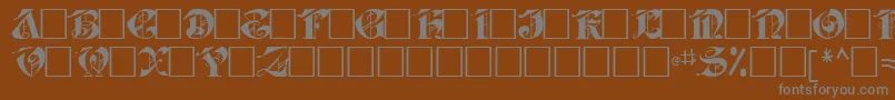 Jabacaps105Regular Font – Gray Fonts on Brown Background