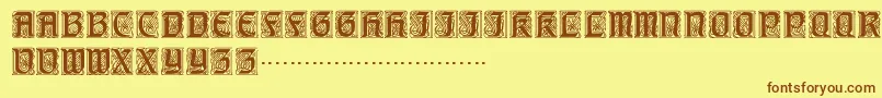 Шрифт TitlingcapsRegular – коричневые шрифты на жёлтом фоне