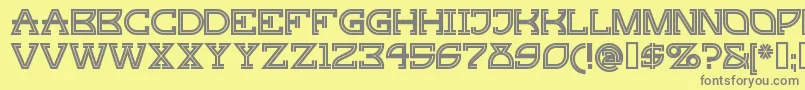 フォントGingerpeachy – 黄色の背景に灰色の文字