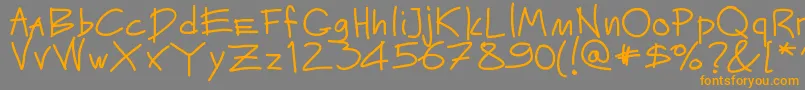 Mateur-Schriftart – Orangefarbene Schriften auf grauem Hintergrund