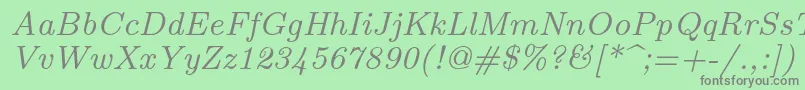 Fonte Lmroman8Italic – fontes cinzas em um fundo verde