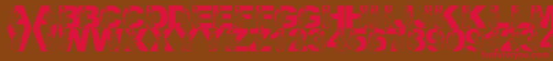 フォントLmsPreformingPachyderm – 赤い文字が茶色の背景にあります。