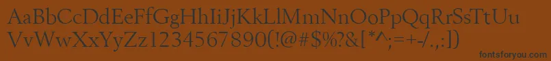 フォントBestsellerRegular – 黒い文字が茶色の背景にあります