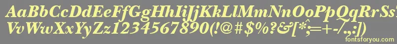 BaskervillenovatwoblackRegularitalic-fontti – keltaiset fontit harmaalla taustalla