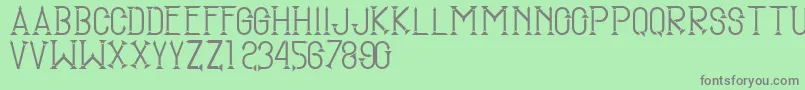 SmgTugumuda Font – Gray Fonts on Green Background