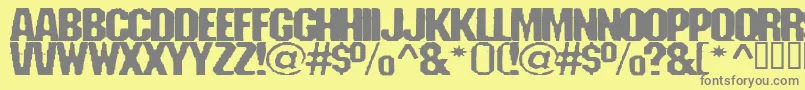 フォントFanatikatwo – 黄色の背景に灰色の文字