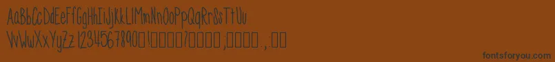 Skinnyness Font – Black Fonts on Brown Background