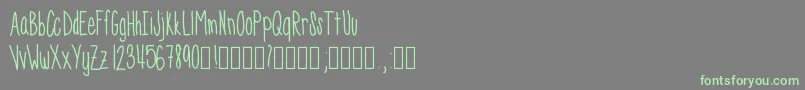 Skinnyness Font – Green Fonts on Gray Background
