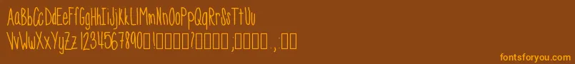 Skinnyness Font – Orange Fonts on Brown Background