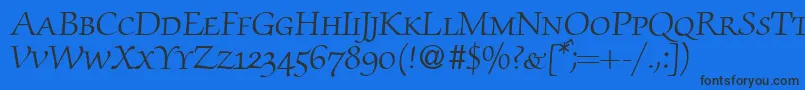 フォントZabriskiescriptsmcRegularDb – 黒い文字の青い背景