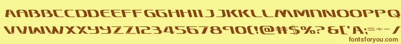 フォントSkymarshalleft – 茶色の文字が黄色の背景にあります。