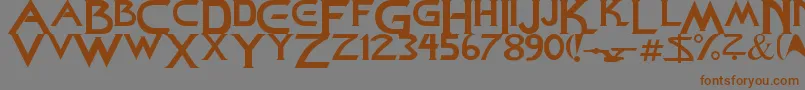 フォントStarDown – 茶色の文字が灰色の背景にあります。