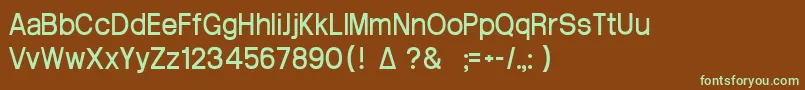 フォントArctik3 – 緑色の文字が茶色の背景にあります。