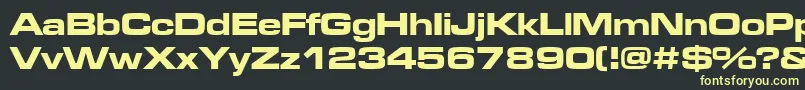 Microgrammadeebolext Font – Yellow Fonts on Black Background