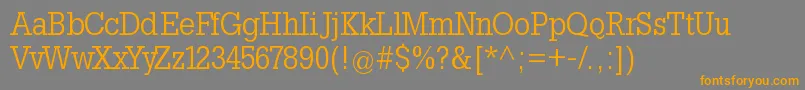 Slabtallx Font – Orange Fonts on Gray Background