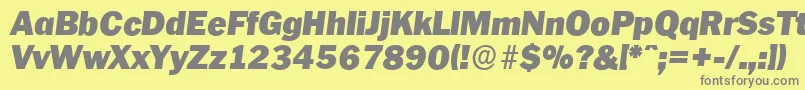 PlymouthserialBlackItalic-fontti – harmaat kirjasimet keltaisella taustalla