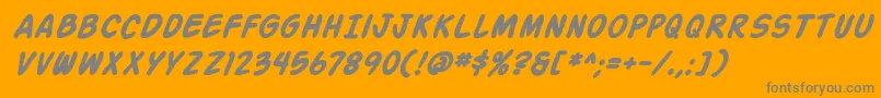ActionManBoldItalic-fontti – harmaat kirjasimet oranssilla taustalla
