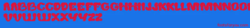 CreamyButter Font – Red Fonts on Blue Background