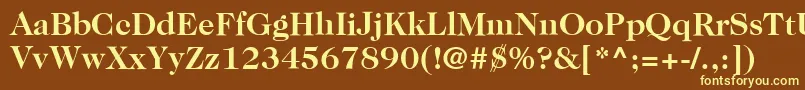 ItcCaslon224LtBold-fontti – keltaiset fontit ruskealla taustalla